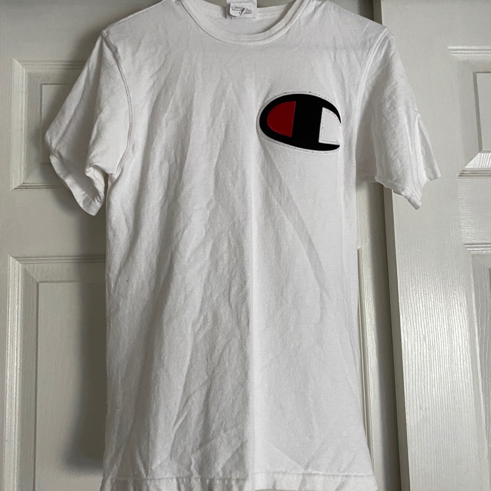 Five boys champion shirts. Size ranges from Boys Small to Boys Extra Large